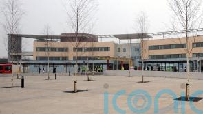 Man arrested after two people stabbed at hospital