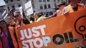 Water thrown onto slow marching Just Stop Oil protesters