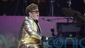 Who were Sir Elton John’s surprise musical guests at Glastonbury?