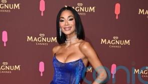 Nicole Scherzinger announces engagement to Thom Evans
