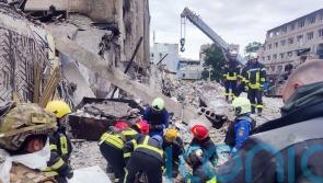 Ukraine accuses local man of directing missile strike that killed 11