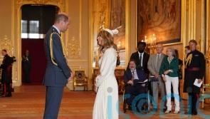 Derek Draper watches as wife Kate Garraway collects MBE from William