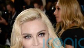 Madonna postpones tour after spending several days in intensive care