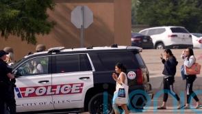 Police release body camera video of an officer killing gunman who killed eight
