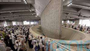 Muslim pilgrims take part in stoning of the devil as Hajj pilgrimage winds down