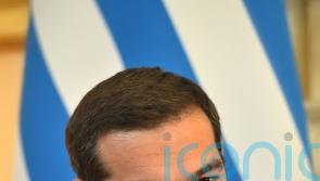 Greece’s left-wing opposition leader steps down after crushing election defeat