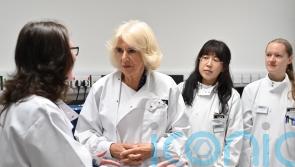 Queen dons lab coat to learn about diabetes research