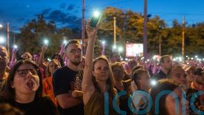 Thousands in demonstration against Serbian TV station after mass shootings