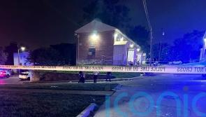 Hunt for suspects after shooting at street party leaves two dead