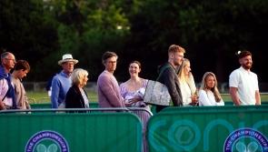 Wimbledon fans may have to battle through rain to watch day two