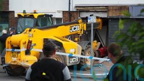 Trains disrupted as man arrested over bid to steal ATM using crane