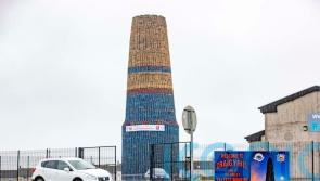 Towering bonfire bears banner to raise money for sick girl