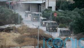 Israeli troops begin leaving Jenin camp as heavy fighting continues