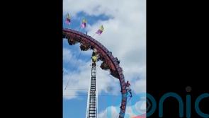 Riders trapped upside down for hours on rollercoaster