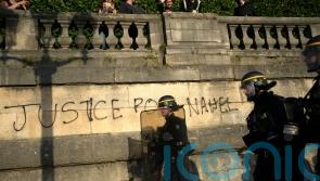 Macron says France needs to address causes of unrest prompted by police killing