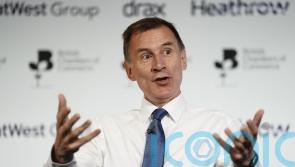 Hunt downplays tax cuts odds, conceding calming inflation is tougher than feared
