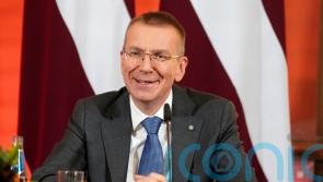 Latvia’s foreign minister sworn in as new president