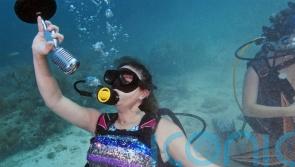 Underwater music show in Florida Keys promotes coral reef protection
