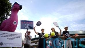 Climate activists protest against Barclays’ sponsorship outside Wimbledon gate
