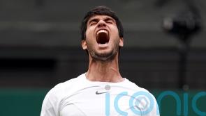Carlos Alcaraz overcomes biggest Wimbledon test yet to reach the quarter-finals
