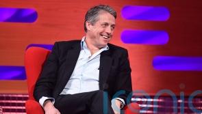 Hugh Grant revealed as tiny green and orange Oompa-Loompa in Wonka trailer
