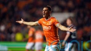 Swansea sign striker Jerry Yates from Blackpool