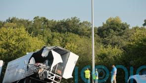 Three killed as Greyhound bus crashes into parked lorries in Illinois
