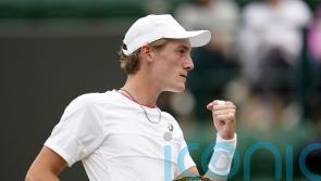 Henry Searle stays on course in bid to emulate Stanley Matthews at Wimbledon