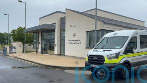 Man, 38, charged with murder after body found in water
