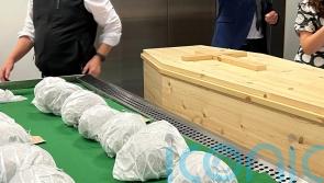 Reburial ceremony held as 400-year-old human skulls returned to Irish island