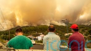 Better weather conditions help slow down La Palma wildfire, authorities say