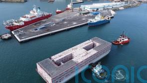 Bibby Stockholm met by protesters as it arrives into Portland Port