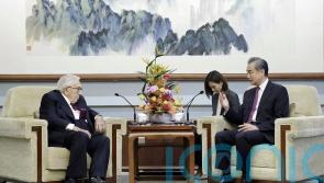 China looks to Kissinger meeting to improve strained relations with US