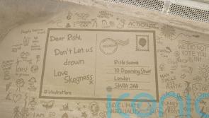 Sand sculpture ‘postcard’ to PM highlights climate risk to coastal communities