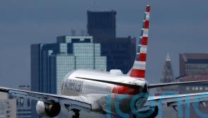 American Airlines makes 1.3 billion dollars as travel booms and fuel prices drop