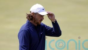 Tommy Fleetwood driven on by home support as he takes share of Open lead
