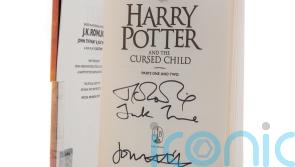 Copy of Harry Potter play signed by JK Rowling sells at auction
