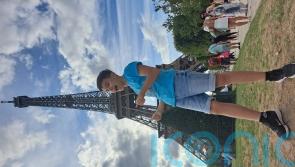 Teen who recovered from broken back completes charity Eiffel Tower climb