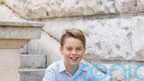 Prince George pictured smiling in photograph released to mark 10th birthday