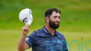 Jon Rahm shoots stunning 63 to surge into contention at The Open