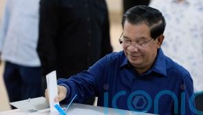 Cambodian PM’s party claims landslide election win amid suppression claims
