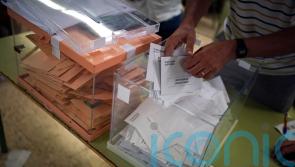 Spain’s Socialists and conservative challengers neck-and-neck in election count