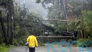 Typhoon leaves at least two dead and displaces thousands in northern Philippines