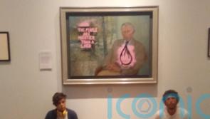 Climate activists paint over portrait of King in Scottish museum