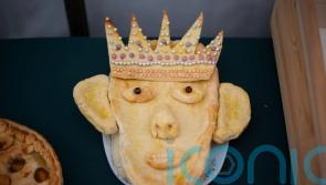That looks very much like my husband, says Queen as King is depicted in pie form