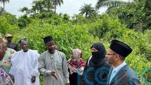 British Muslim woman overseeing experimental farm at Islamic convention in UK
