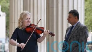 Woman who played violin during brain surgery reunites with doctor