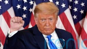 Trump charged over efforts to overturn 2020 presidential election results