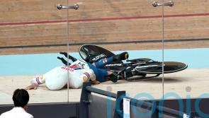 Great Britain’s team pursuit world title defence ends with crash in qualifying