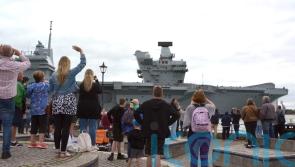 HMS Prince of Wales returns to Portsmouth Naval Base with fixed propeller shaft